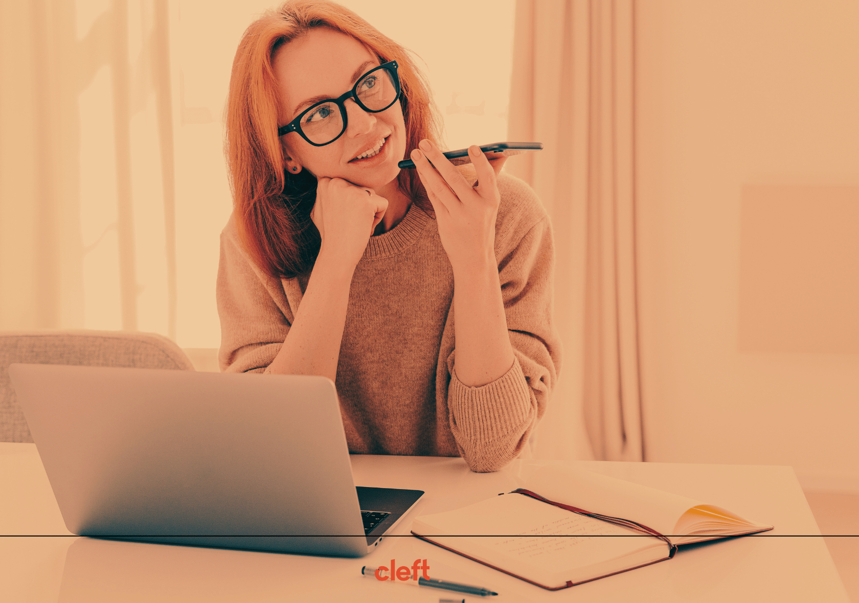A creative director at her desk, recording detailed feedback with Cleft voice memos while working on a laptop. The Cleft logo is visible at the bottom.